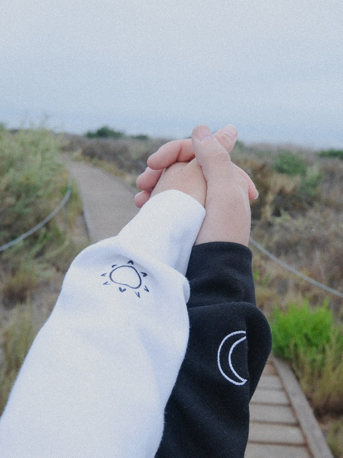Rejoice & Do Good Christian Apparel - This is the matching crew sweatshirts based on Genesis 1. One sweater has the word Day embroidered on it while it has a little sun on the wrist and the other has Night and a moon.